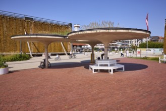 Seating areas with sunshades and graduation tower in the Bad Salzuflen park, Lippe district, North