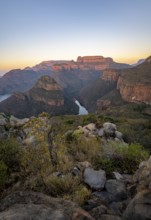 Sunset at Blyde River Canyon with Three Rondawels peak, view of canyon with Blyde River and Mesa