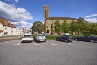 Car park and Luther Church in Datteln, Ruhr area, Recklinghausen district, North Rhine-Westphalia,