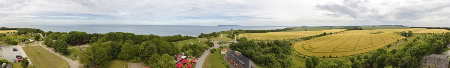 Panorama of a coastal landscape with fields and a distant sea view, Rügen