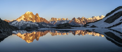 Evening mood, mountain landscape at sunset, alpenglow, water reflection in Lac Blanc, mountain