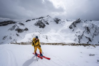 Ski tourers ascending from the Iffigtal to the Wildhornhütte, snow-covered mountain landscape,