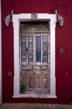 Entrance door, weathered, red, Loulé, Algarve, Portugal, Europe