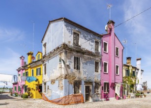 City view of Burano with colourfully painted houses and canals. Burano, Venice, Veneto, Italy,