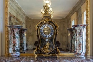 18th century Chastelain of Paris mantel clock at Château de Bel?il, Baroque castle in Beloeil,