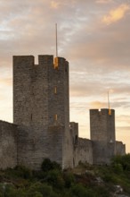 Historic city wall with defence towers in the evening light, Hanseatic city of Visby, UNESCO World