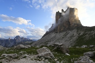 Tre Cime di Lavaredo with clouds in summer, Dolomites, South Tyrol, Italy, Europe