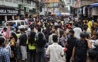 Crowd of people to shop at a street market ahead of Durga Puja festival on October 7, 2024 in