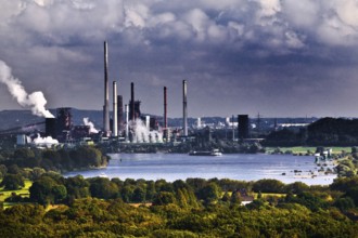 View from the Rheinpreussen spoil tip to Duisburg with ships on the Rhine and the Thyssen Krupp