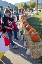 Lakewood, Colorado, Families enjoy the pre-Halloween Haunted Trail event at Bear Creek Lake Park.