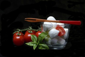 Cherry tomatoes and mozzarella cream cheese in a jar, cherry tomato