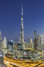 Burj Khalifa skyline tallest building in the world from above in Downtown at night in Dubai, United