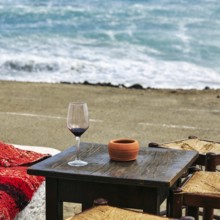 Empty wine glass on simple wooden outdoor table, bar, beach bar, Cabo-de-Gata-Nijar, Cabo de Gata,