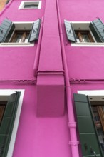 Coloured house facade with fireplace, Burano, Venice, Veneto, Italy, Europe