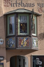 Historic bay window at the Zum Goldenen Rad inn, Hauptstraße 38, Rottweil, Baden-Württemberg,