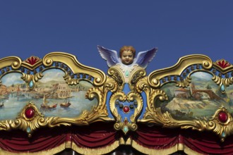 Deatil of an angel on a historical carousel, Rome, Italy, Europe