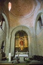 Interior of a church with magnificent altar, stone arches and religious decorations, Santuario de