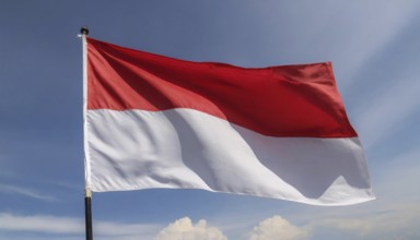 The flag of Indonesia flutters in the wind