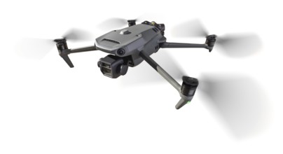 Front view of a drone quadcopter UAV in flight isolated on a white background