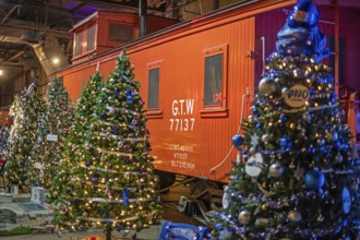 St. Thomas, Ontario Canada - Decorated Christmas trees and historic railway rolling stock are on