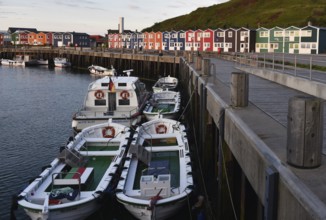 Lobster shacks and fishing boats in the harbour of Heligoland, Schleswig-Holstein, Germany, Europe