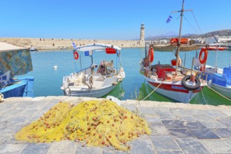 Fishing boat moored at Venetian harbour, Rethymno, Crete, Greece, Europe