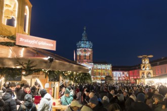 Mulled wine stand and Christmas pyramid at the Christmas market at Charlottenburg Palace. Berlin,