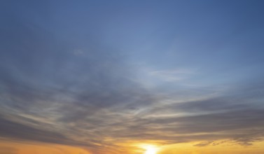 Dramatic sunset skies, cloudscape of rich color twilight sky. Sunset cloud background.