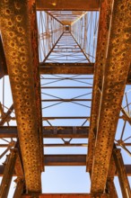 Rusted remains of a former oil derrick, Arabian Peninsula, Sultanate of Oman