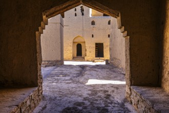 Narrow passageway in the largest preserved mud town in Oman, Al Bilaad, Al Bilaad Historical