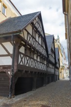 Narrow half-timbered house in a cobblestone alley, rustic atmosphere, Wallenstein houses, Liberec,