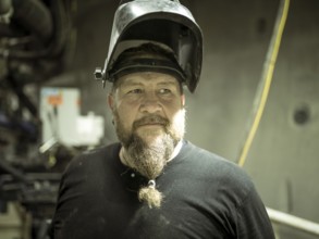 Welder on the Wilma double-shield tunnel boring machine in the H53 construction lot, Brenner Base