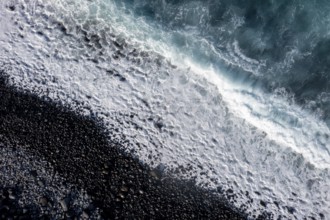 Waves on the beach, turquoise sea and black pebble beach, aerial view, La Gomera, Canary Islands,