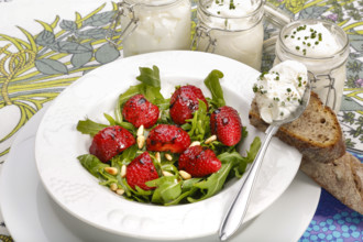 Swabian cuisine, Luggeles cheese in a jar, salad rocket with strawberries, pine nuts, Swabian cream