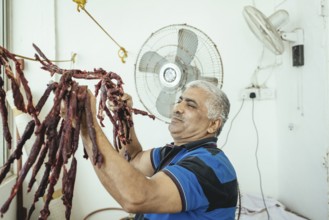 Dried camel meat in the camel restaurant with its own camel butchery on the state road from Salalah