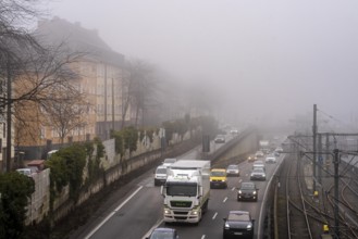 Dense fog, with visibility sometimes less than 100 metres, A40 motorway, city passage in Essen,