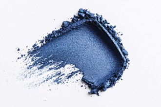 Blue eye shadow makeup swatch on white background. Generative AI, AI generated