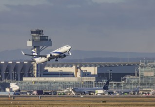 Aircraft taking off in front of the terminal and tower at Fraport Airport. Aircraft registration: