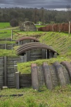 Reconstructed World War One trench with elephant shelters made of corrugated iron near WWI