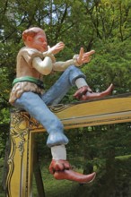 Sculpture for the fairy tale The Brave Little Tailor, fairy tale figure, gesture, arms, sitting,