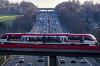 A3 motorway between Düsseldorf and Leverkusen, near Erkrath, railway bridge, Regio train