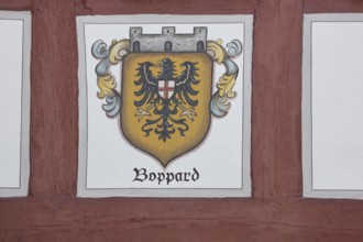 Town coat of arms with inscription on half-timbered house in Boppard, Rhineland-Palatinate, Upper