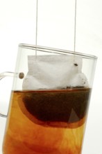 Cup of black tea, tea bag