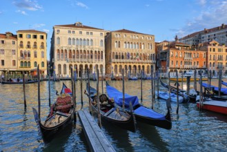 Grand Canal with boats and gondolas on sunset, Venice, Italy, Europe