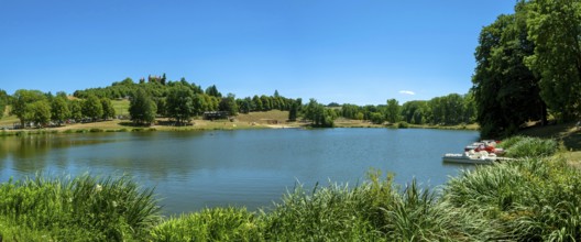 The castle of Montfort overlooking the lake of Vernet la Varenne. Puy de Dome department. Auvergne