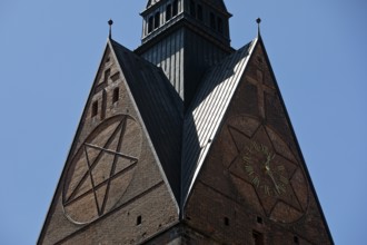 Tower detail of the Marktkirche St. Georgii et Jacobi with hexagram and tower clock, state capital