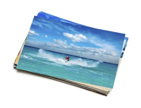 Holidays beach adventure concept creative background, stack of vacation photos with man riding jet