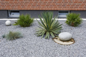 Modern front garden with stone surface, gravel garden, North Rhine-Westphalia, Germany, Europe