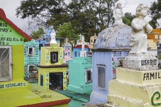 Colourful memorials, gravestones and tombstones at Hoctún Cemetery near Mérida, Yucatán, Mexico,