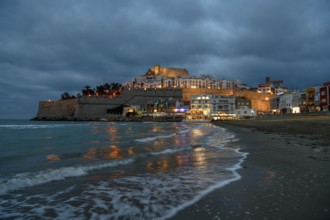 Old town with the Romanesque castle from the 14th century, blue hour, Peñíscola, province